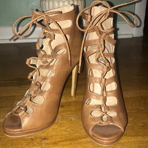 Cute faux leather laces tan heels!! Never worn!